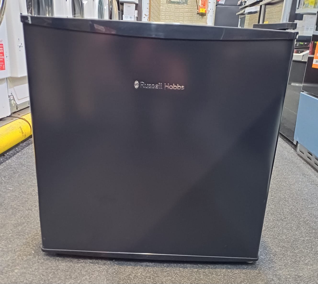 WhatsApp Image 2025-12-17 at 9.50.08 AM (1) RUSSELL HOBBS RHTTFZ0E1B Mini Freezer - Black - Image 1